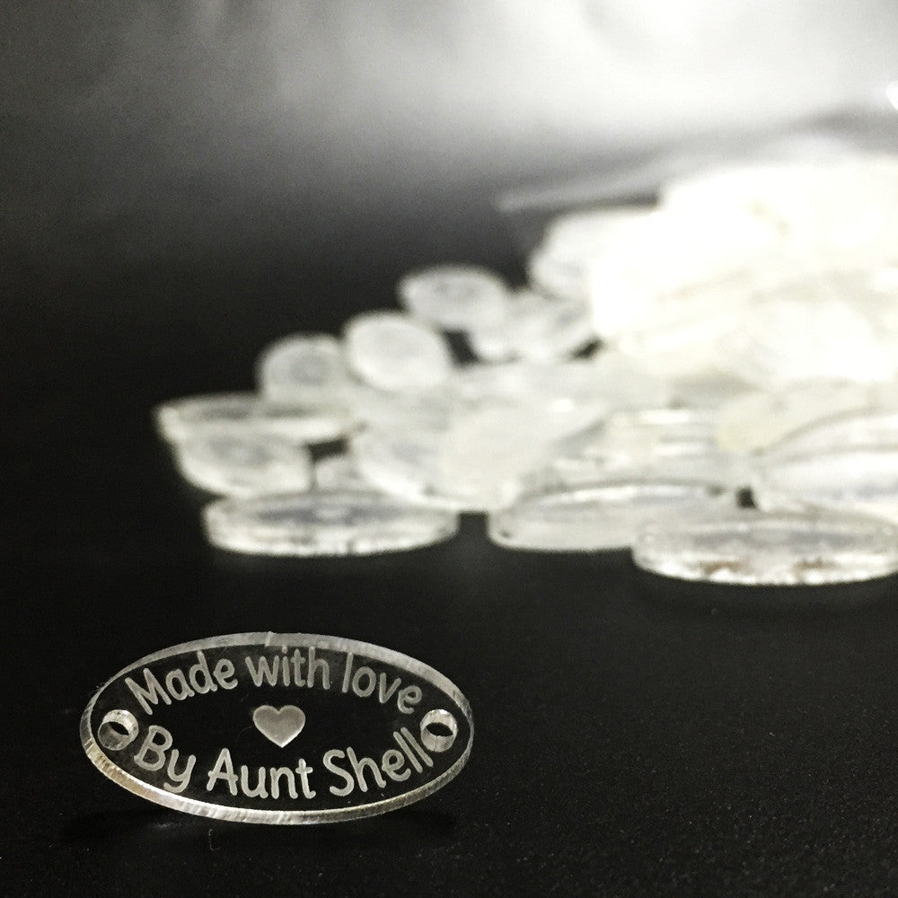 100 Etiquetas Acrílico Ovalada - Dos Perforaciones - Etiquetas Acrílico - Altorrelieve Diseño